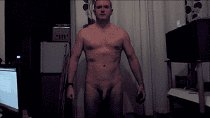 Naturist nudist nude naked penis - male model standing confidently.